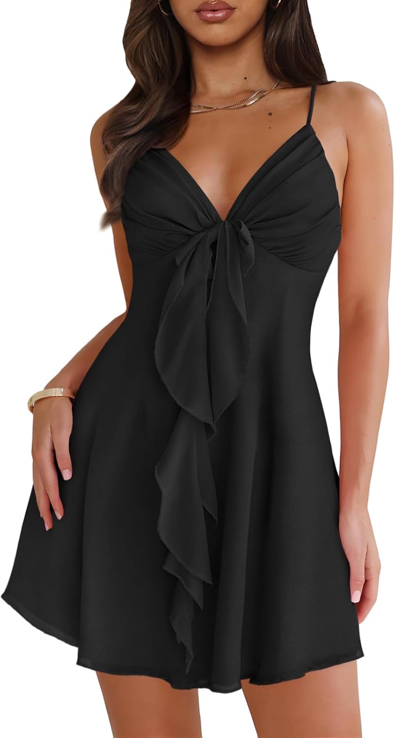 Mesh mini dress with spaghetti straps, backless back, and bow detail