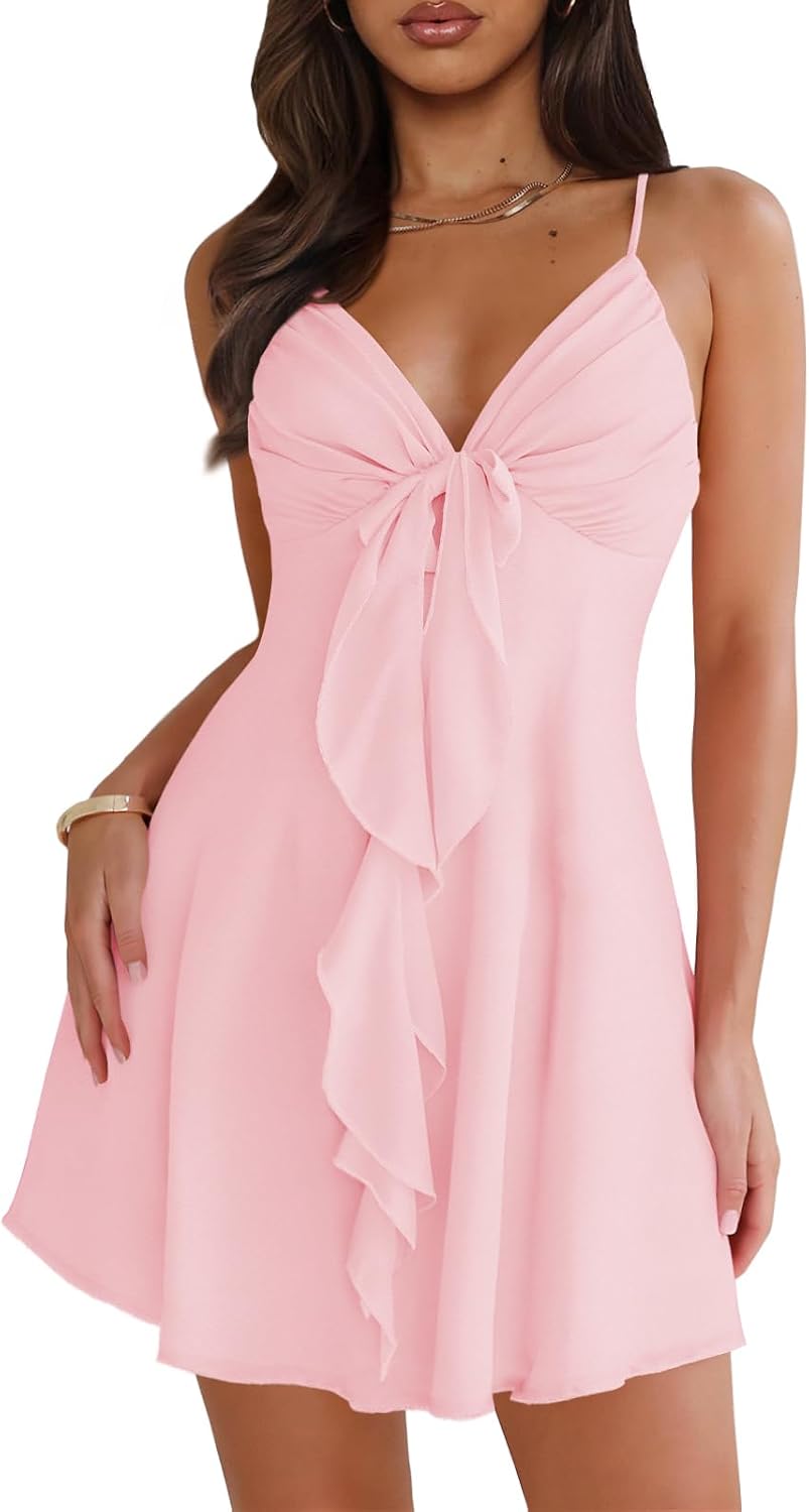 Mesh mini dress with spaghetti straps, backless back, and bow detail