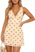Model wearing polka dot mini dress