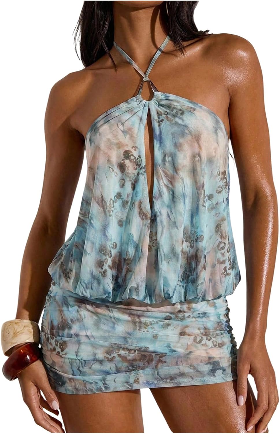 Front view of tie-dye halter mini dress
