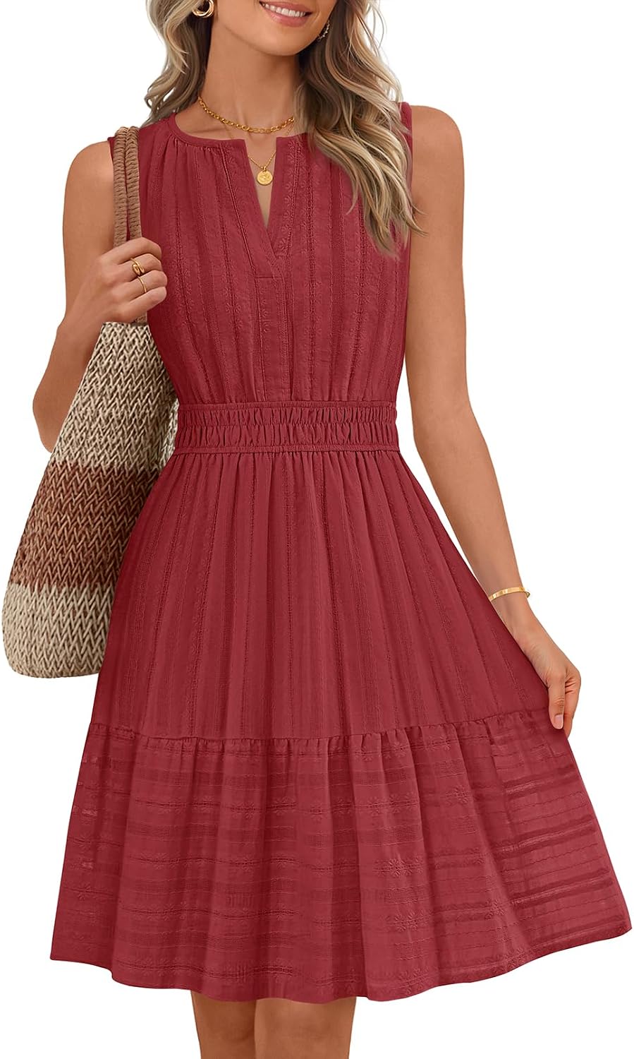 Sleeveless V-neck mini sundress with ruffle hem and elastic waist