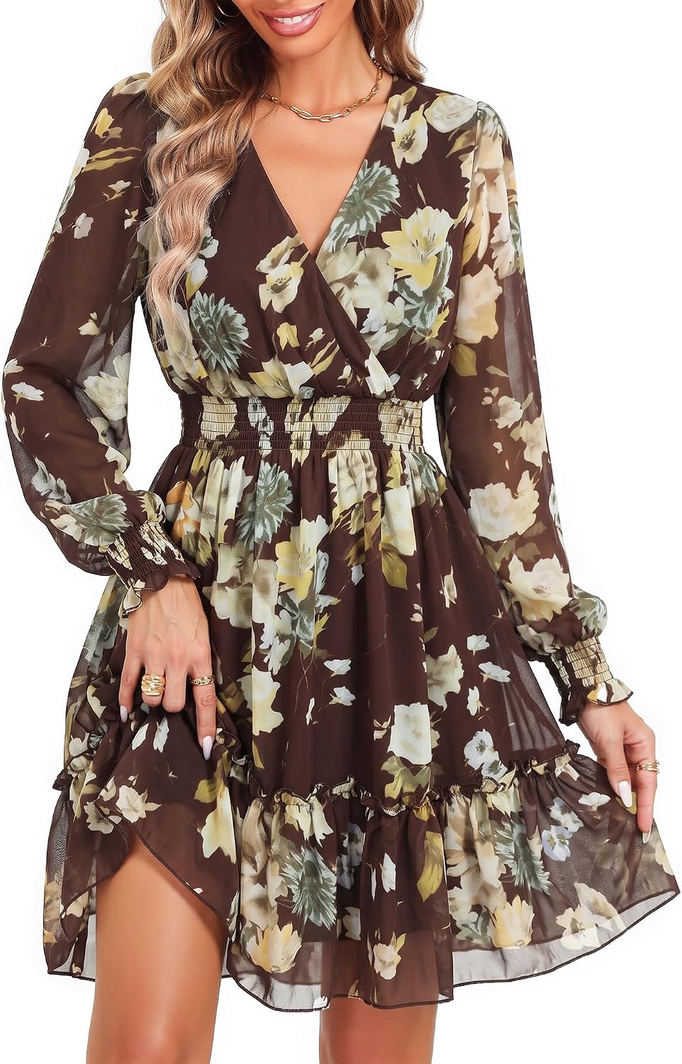Model posing in flowy mini dress